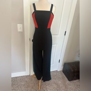 Black, Green and Red Jumpsuit. Stretchy and form fitting. Medium-very forgiving